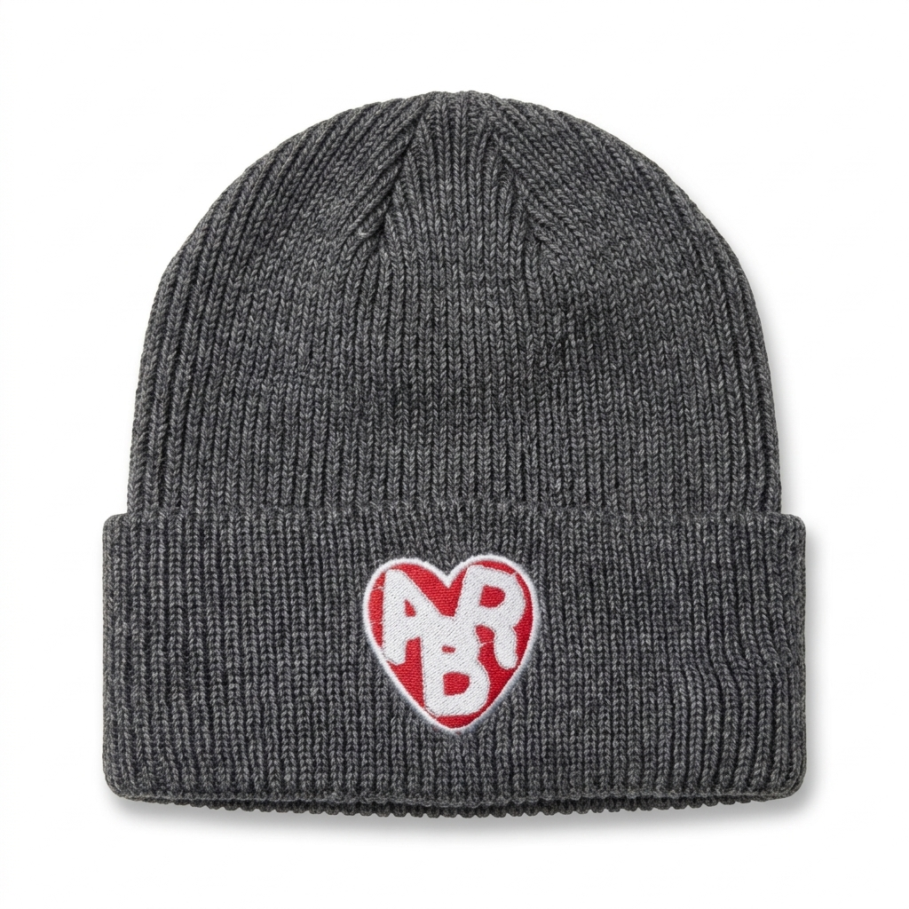 Black ABR Beanie from The ABR Store, made of soft knit fabric, featuring a folded brim and minimal branding.